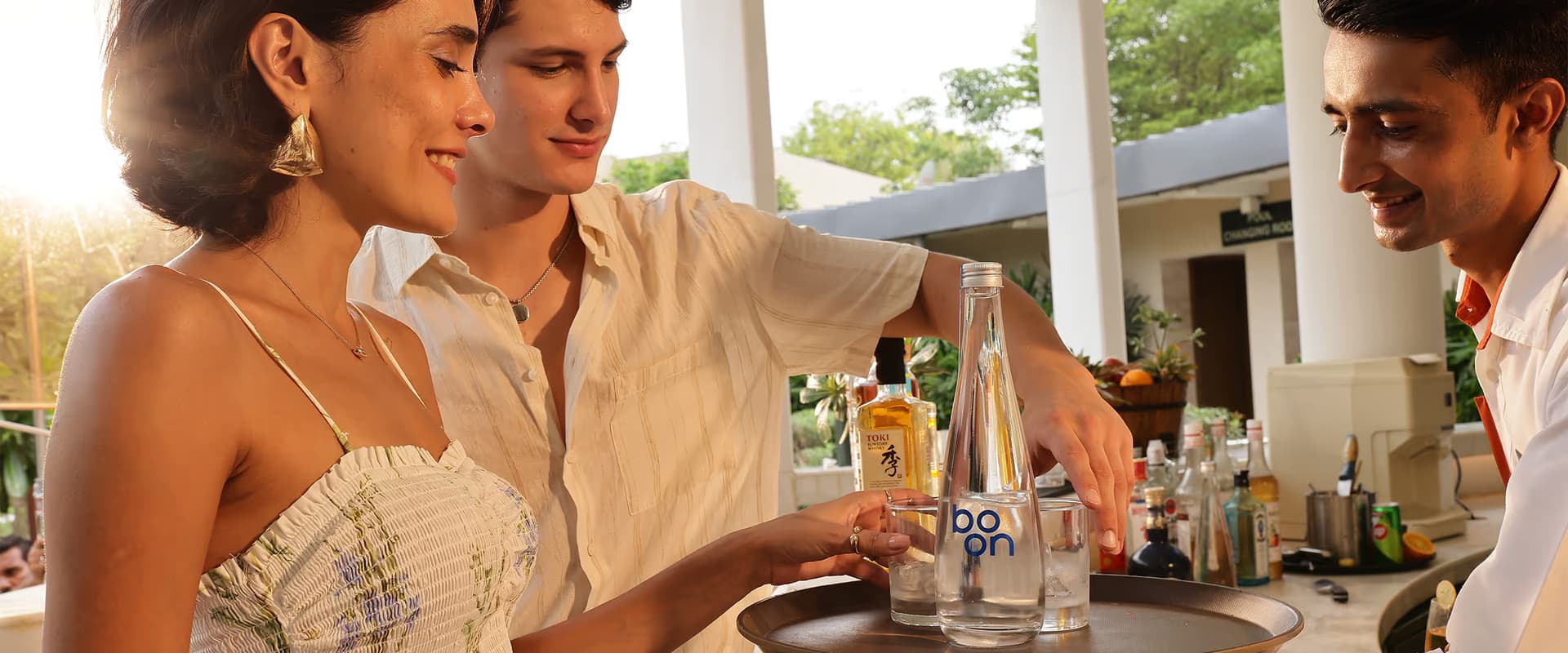 Glass bottles on the Boon Refill Ultra conveyor