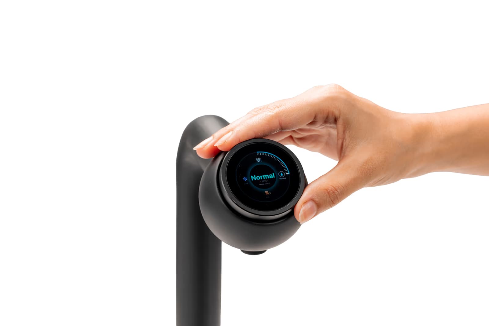 A hand turning the Boon Purify Tap Pro P1 rotary dial, with Normal selected on its display